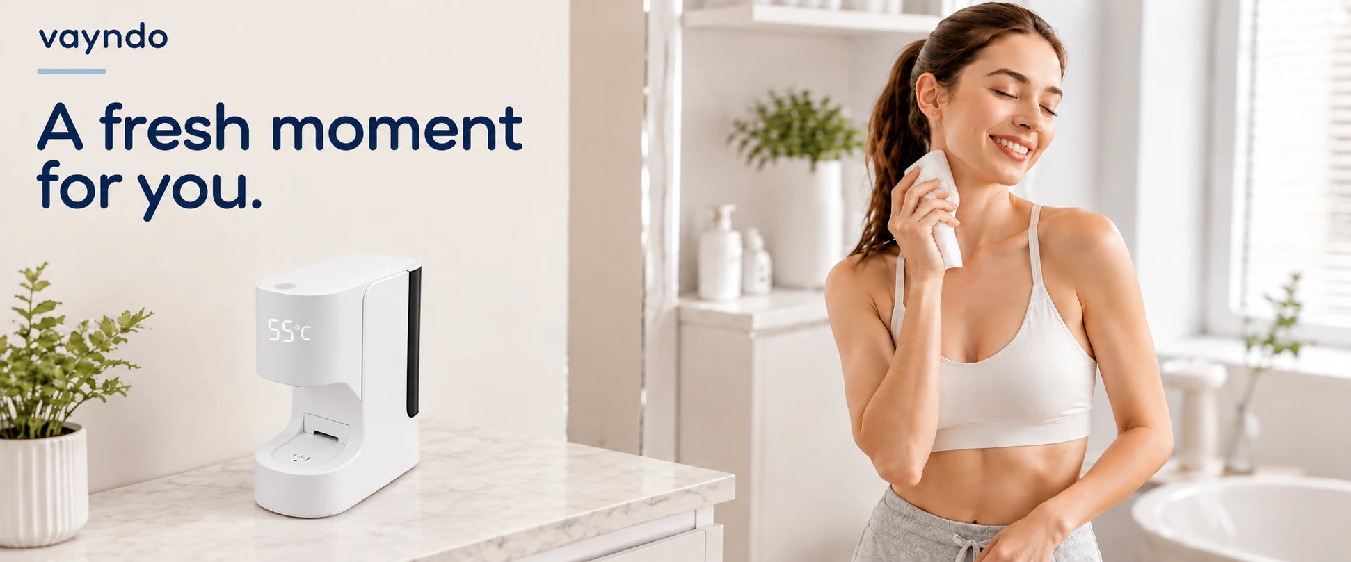 VAYNDO: A fresh moment for you. Woman using a facial towel beside the compact dispenser